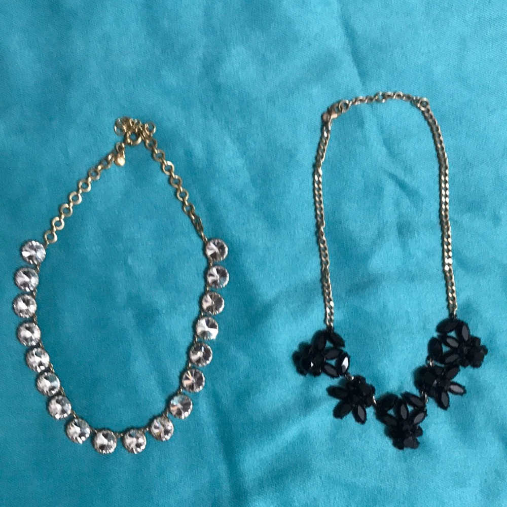 J Crew set of two necklaces one in crystal & one in black with gold tone chain.